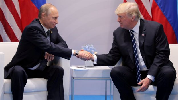 Donald Trump shakes hands with Vladimir Putin during their bilateral meeting at the G20 summit in Hamburg, Germany (July 7, 2017)