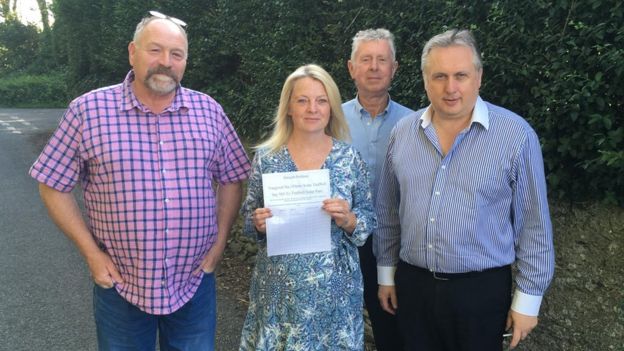 Vaughan Evans, Bernadette Loader, Emlyn Williams and Hywel Hughes who are opposed to Parc Solar Traffwll on Anglesey