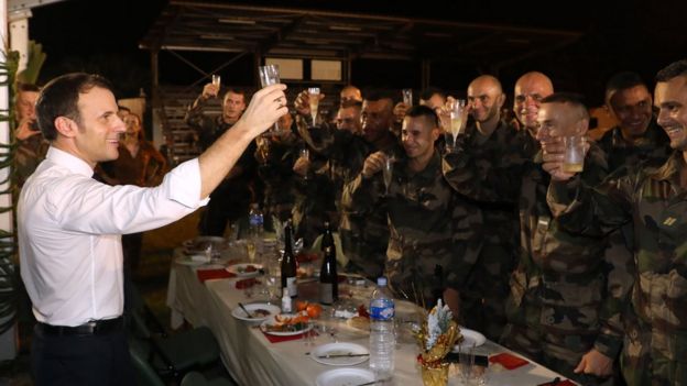 French President Emmanuel Macron has Christmas dinner with French troops at the Port-Bouet military camp near Abidjan, Ivory Coast, on 21 December, 2019.