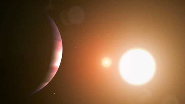 Planet TOI 1338 b orbiting two stars