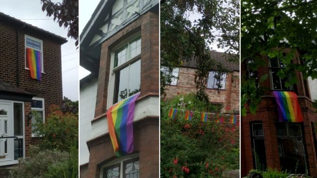 Image result for street flies rainbow flags to support neighbour