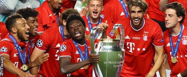 Bayern Munich's Alphonso Davies lifts the Champions League