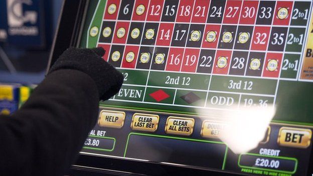 A punter tries out a fixed-odds betting terminal