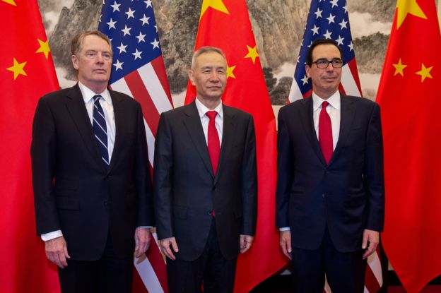 China's Vice Premier Liu He (C) poses for a photo with US Treasury Secretary Steven Mnuchin (R) and US Trade Representative Robert Lighthizer (L) at Diaoyutai State Guesthouse in Beijing on March 29, 2019