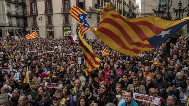 Demonstrators gather in front of the Catalan Government building