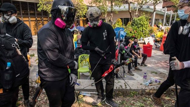 Protesters with bows and arrow at The Hong Kong Polytechnic University on November 14, 2019