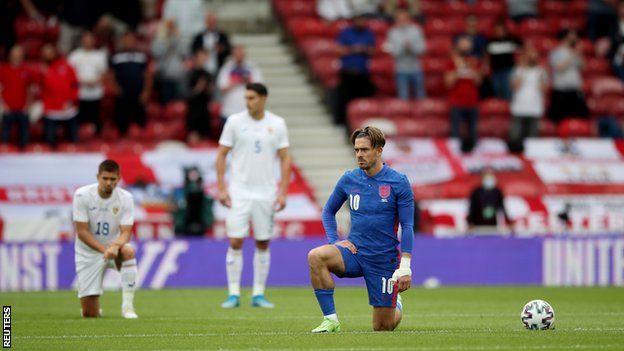 England"s Jack Grealish takes the knee before the friendly with Romania