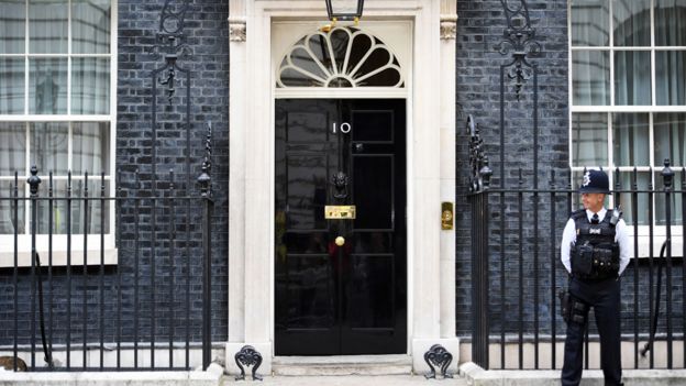A policeman stands on guard outside No 10 Downing Street