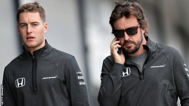 Stoffel Vandoorne of Belgium and McLaren Honda and Fernando Alonso of Spain and McLaren Honda walk in the Paddock during practice for the Formula One Grand Prix of Great Britain at Silverstone