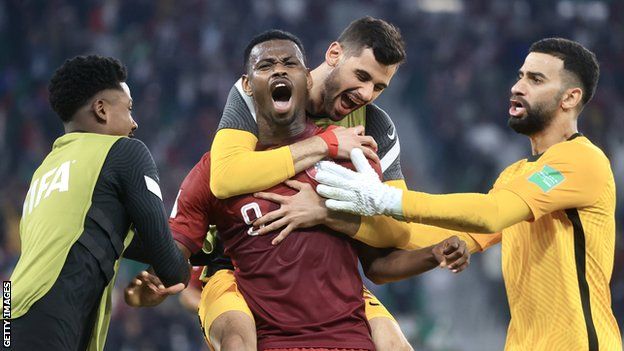 Qatar's Mohammed Muntari celebrates his goal against Algeria