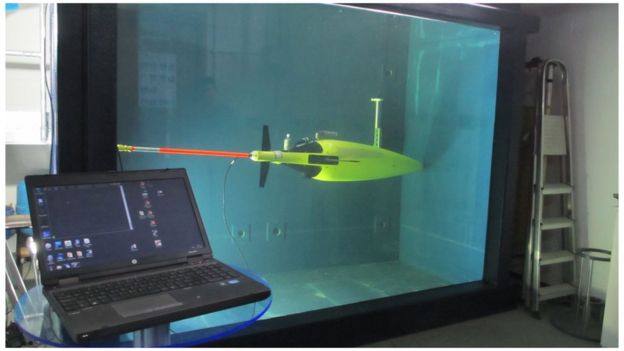 A hydrophone-equipped sea-glider undergoes tests back in the lab