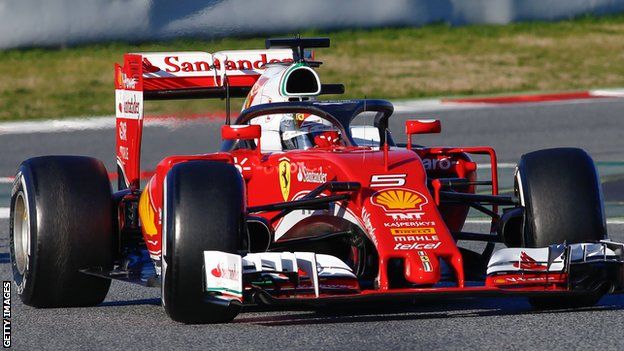 Sebastian Vettel of Ferrari tests the Halo device
