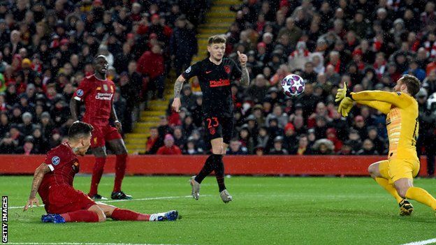 Jan Oblak makes a save against Liverpool