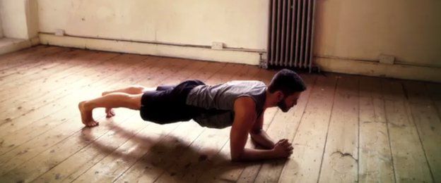 Man doing the plank exercise