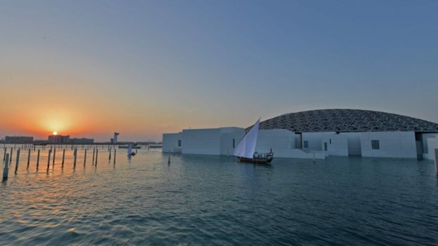 A general view shows part of the Louvre Abu Dhabi Museum designed by French architect Jean Nouvel on 8 November 2017 prior to the inauguration of the museum on Saadiyat island in the Emirati capital.