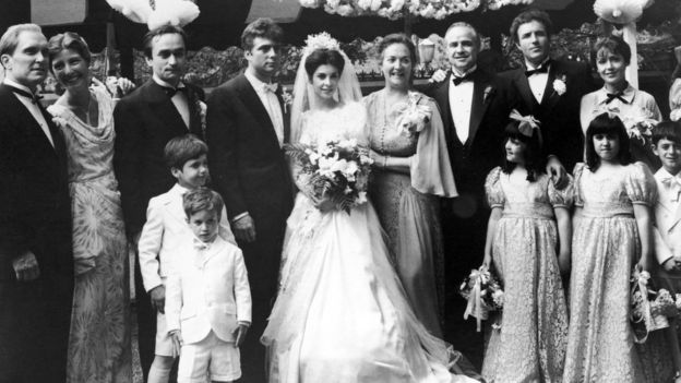 Kinq as Carmela Corleone during The Godfather's famous wedding scene