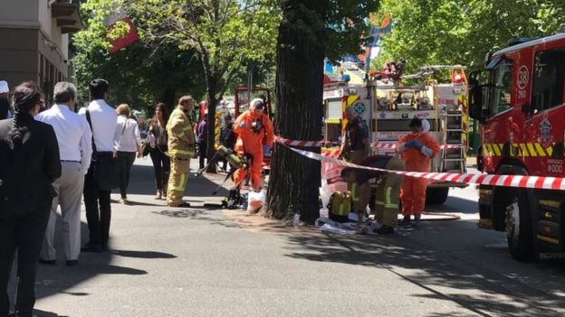 Emergency workers outside India and France's consulates in Melbourne