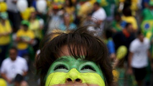 A demonstrator attends a protest against Brazil's President Dilma Rousseff
