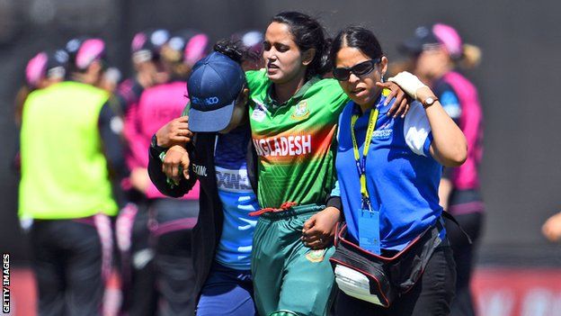 Bangladesh's Nigar Sultana Joty is helped from the field