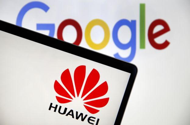 In this photo illustration, the logo of the Chinese company Huawei is displayed on the screen of a laptop in front of a computer screen displaying the logo of Google on May 22, 2019 in Paris, France