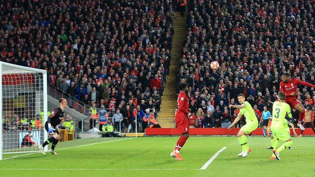 Wijnaldum heads in Liverpool's third goal at Anfield to square the tie at 3-3