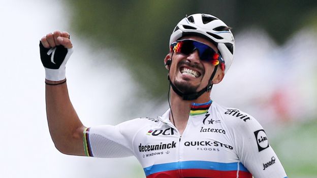 Tour de France spectator arrested over sign crash - BBC News