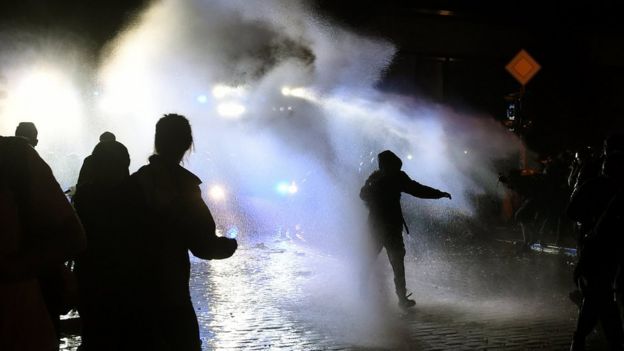 Police using water cannons to break up protests in Hamburg, 8 July 2017