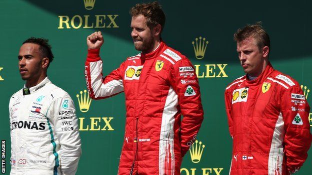 Lewis Hamilton (left) finished second behind the Ferrari duo of Sebastian Vettel (centre), who won, and Kimi Raikkonen (right)