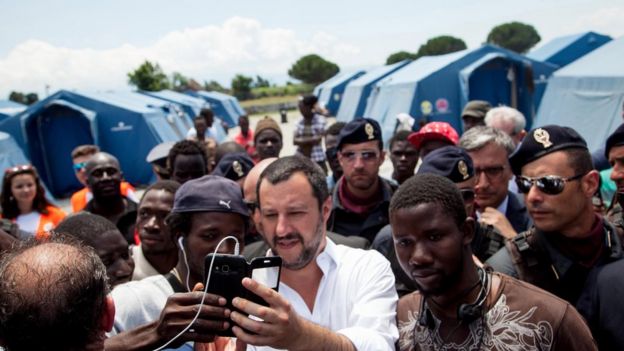 Italian Interior Minister, Matteo Salvini (C) visits a migrants' tent city in San Ferdinando - 10 July 2018