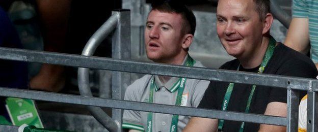 Paddy Barnes (left) watches his friend Michael Conlan secure a quarter-finals place
