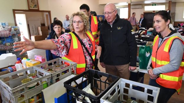 Governor-General of Australia David Hurley speaks to people at a bushfire relief centre in Bairnsdale, East Gippsland, Victoria, 05 January 2020.