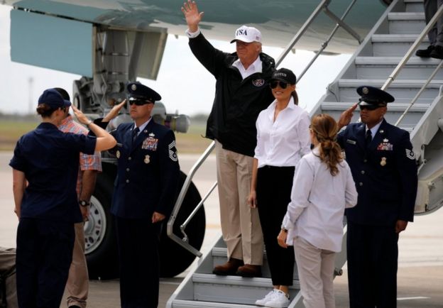 President Donald Trump waves next to First Lady Melania Trump upon arrival in Corpus Christi, Texas, 29 August 2017