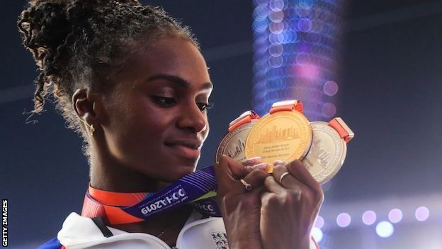 Dina Asher-Smith with her three World Championship medals in Doha in 2019