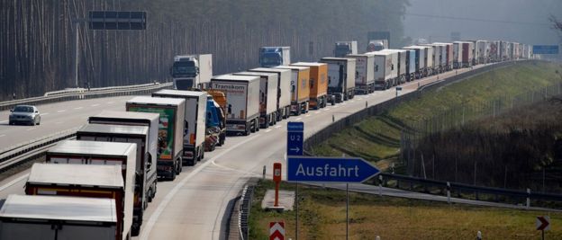 Trucks stuck in a jam on a highway near Fuerstenwalde, southeast of Berlin and about 50km from the Polish border, on 18 March 2020,