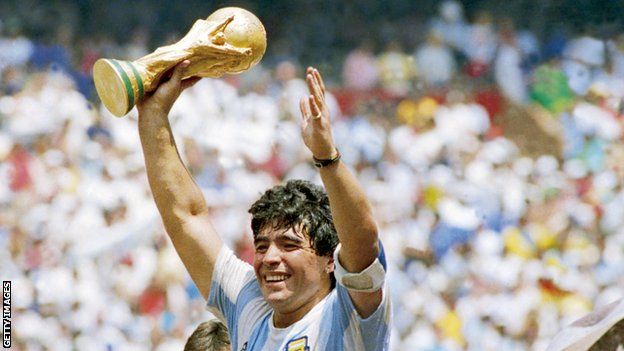 Maradona with the World Cup trophy