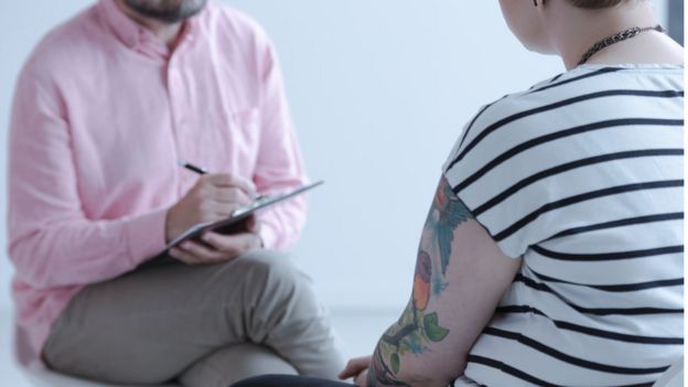 consulting with doctor