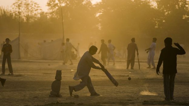 Pakistani children play cricket