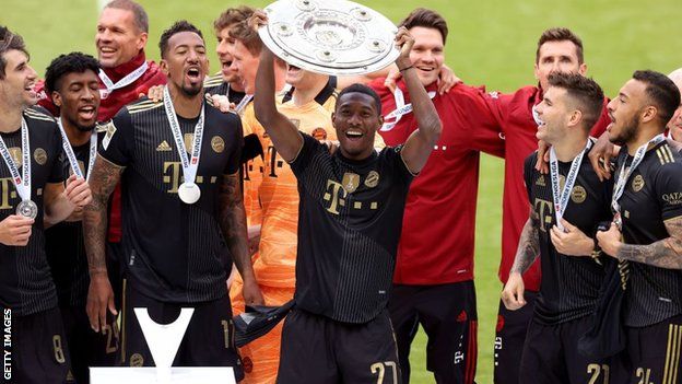 David Alaba celebrates winning Bundesliga Meisterschale Trophy with Bayern Munich