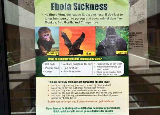 A poster reading 'Ebola Sickness' is displayed at the main entrance of Nigerian Health Minister's office in Abuja on August 6, 2014.