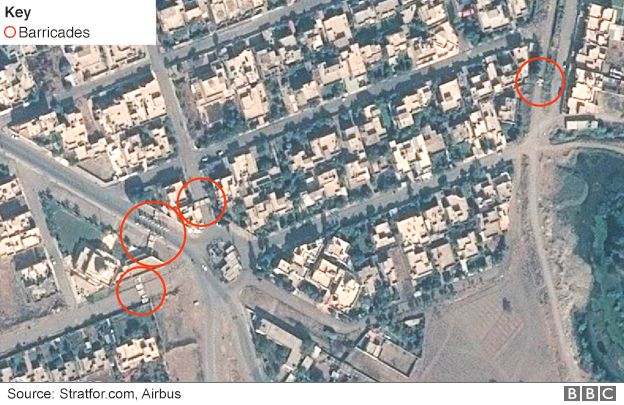 Satellite image showing barricades north of the airport in Mosul