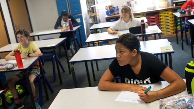 Year 6 children sit at their desks as they are taught at St Dunstan"s College junior school as some schools re-open following the outbreak of the coronavirus disease (COVID-19) in London, Britain