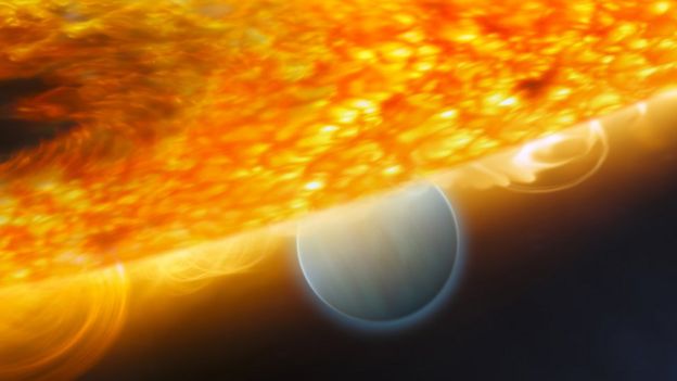 Arte do planeta extra-solar HD 189733b do tamanho de Júpiter sendo eclipsado por sua estrela-mãe