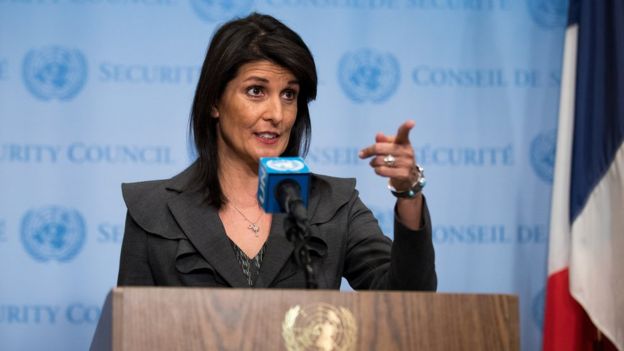 Nikki Haley points to a reporter off-camera at a media briefing in the UN, New York City