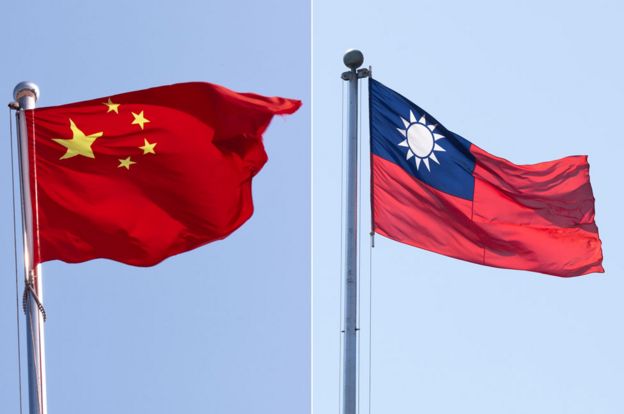 The People's Republic of China flag (left) has largely replaced the Republic of China flag