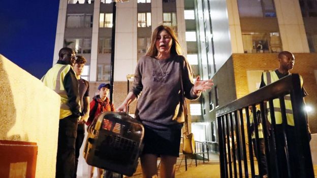 A woman outside Chalcots estate