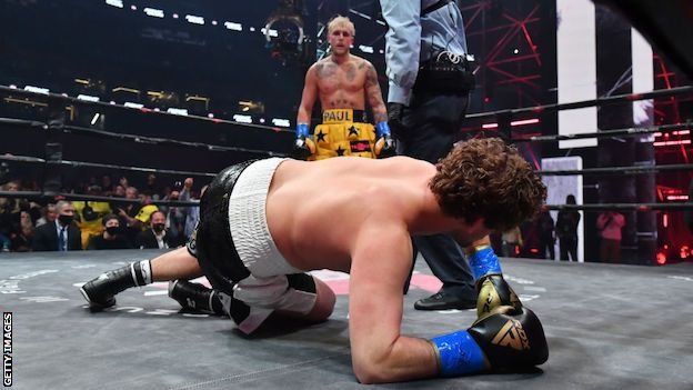 Jake Paul looks down on Ben Askren following his knockout