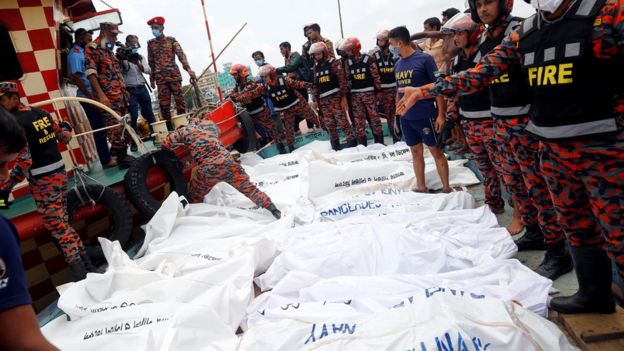 Dead bodies are seen piled up on a boat after a passenger ferry capsized in the river Buriganga in Dhaka, Bangladesh, June 29, 2020.