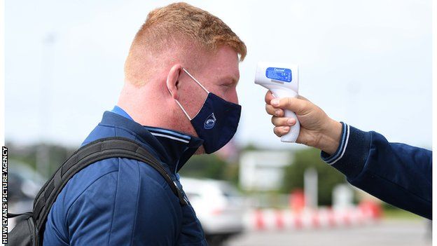 Cardiff Blues and Wales prop Rhys Carre has his temperature taken before the Scarlets fixture