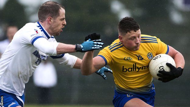 Conor Cox attempts to get away from Monaghan's Conor Boyle at Dr Hyde Park