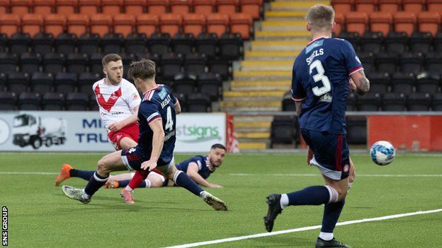 Airdrie's Callum Smith scores to make it 1-0 during a cinch Championship play-off final first leg match between Airdrieonians and Hamilton Academical at the Penny Cars Stadium